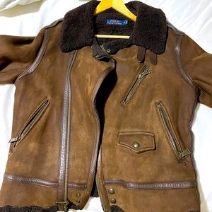 Brown polo shearling motto jacket.